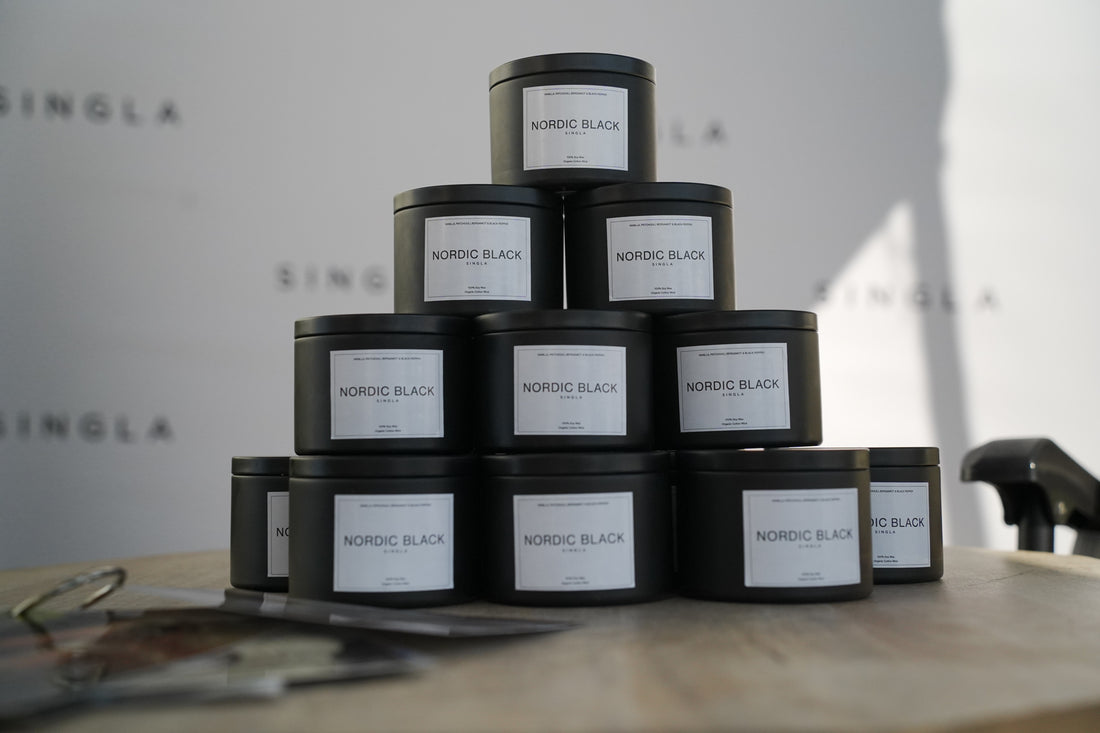 pyramid stack of black tin candles 8oz soy wax and essential oils