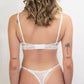 white lace bralette and underwear: sustainable fashion